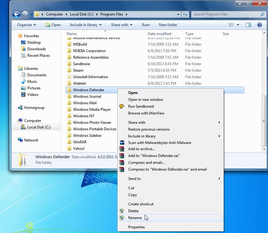 [Image: Right-click the Windows Defender folder and select Rename from the context menu.]
