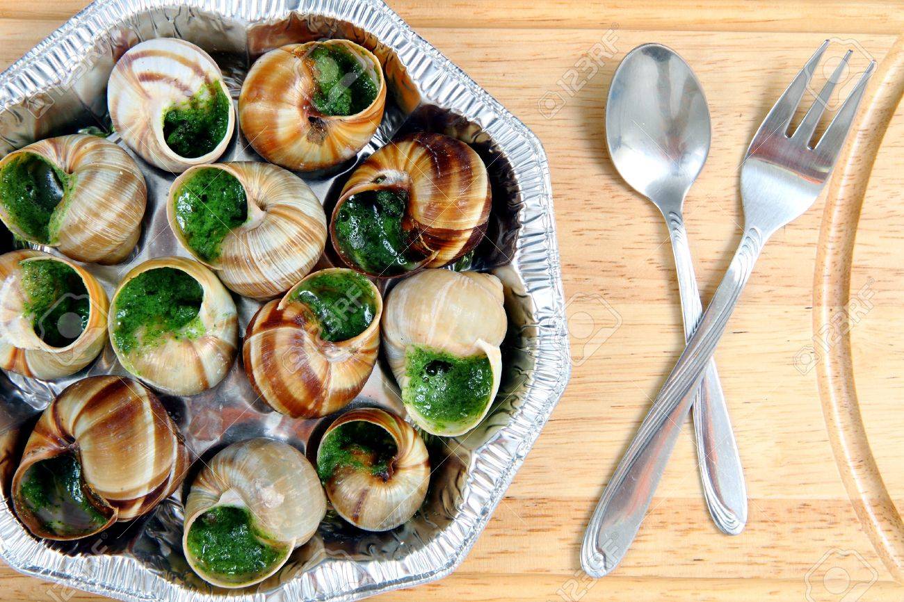 13035251-snails-french-food-as-nice-gourmet-background.jpg