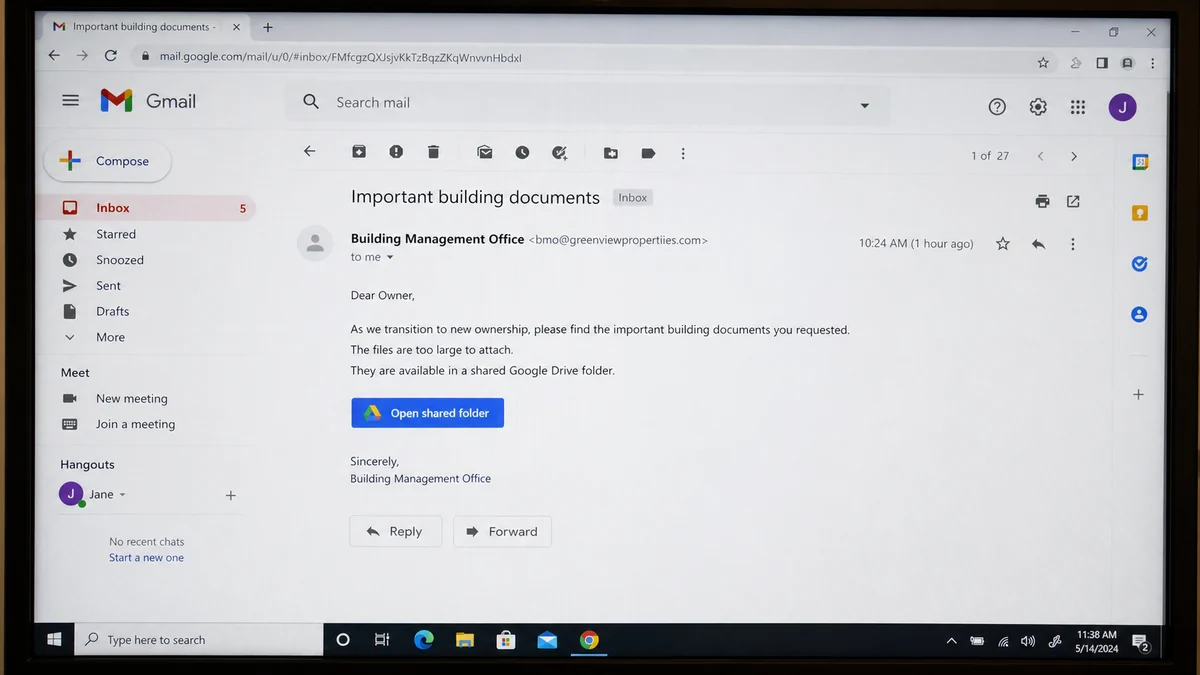 Realistic reconstruction of a fake property management email offering building documents through Google Drive