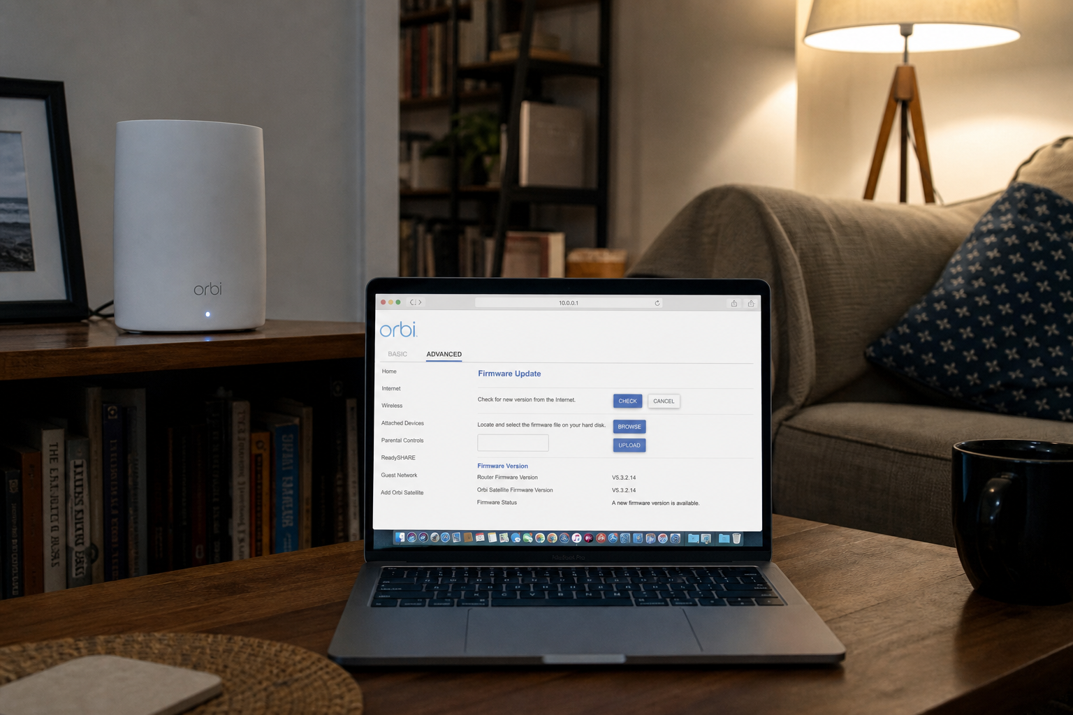 The Orbi mesh still needs V6.3.8.11 1 White Orbi mesh tower on a bookshelf next to a laptop showing the Orbi Firmware Update page