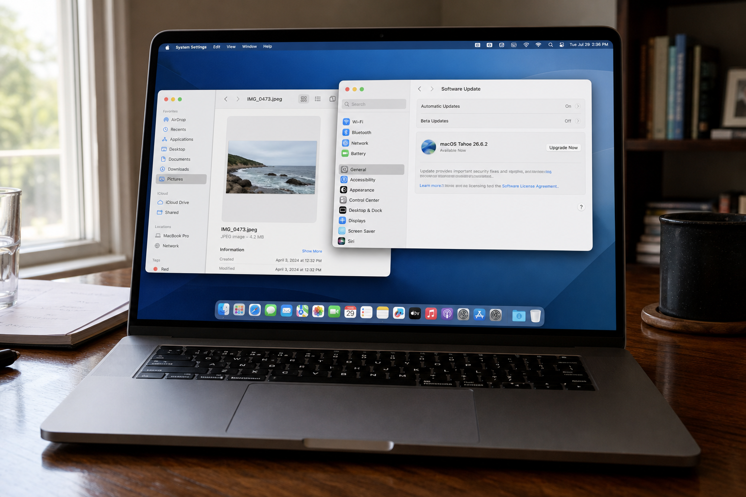 Tahoe still needs 26.6.2. A photo can run code 1 MacBook Software Update showing macOS Tahoe 26.6.2 next to a photo file