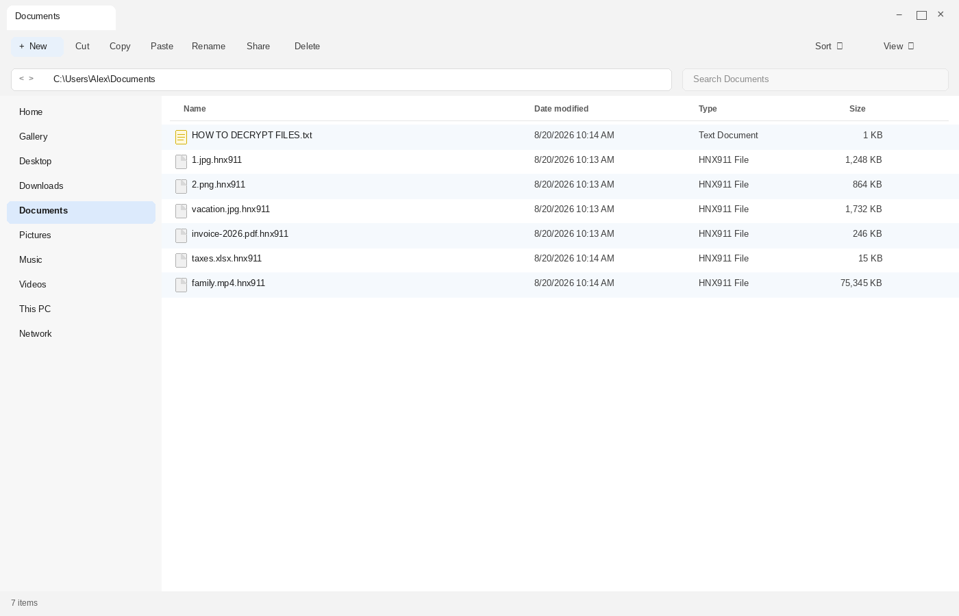 Encrypted files after Hnx911. The .hnx911 names and HOW TO DECRYPT FILES.txt are the tell.