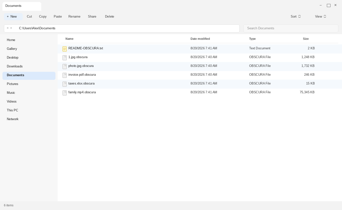 Encrypted files after Obscura. The .obscura names and README-OBSCURA.txt are the tell.