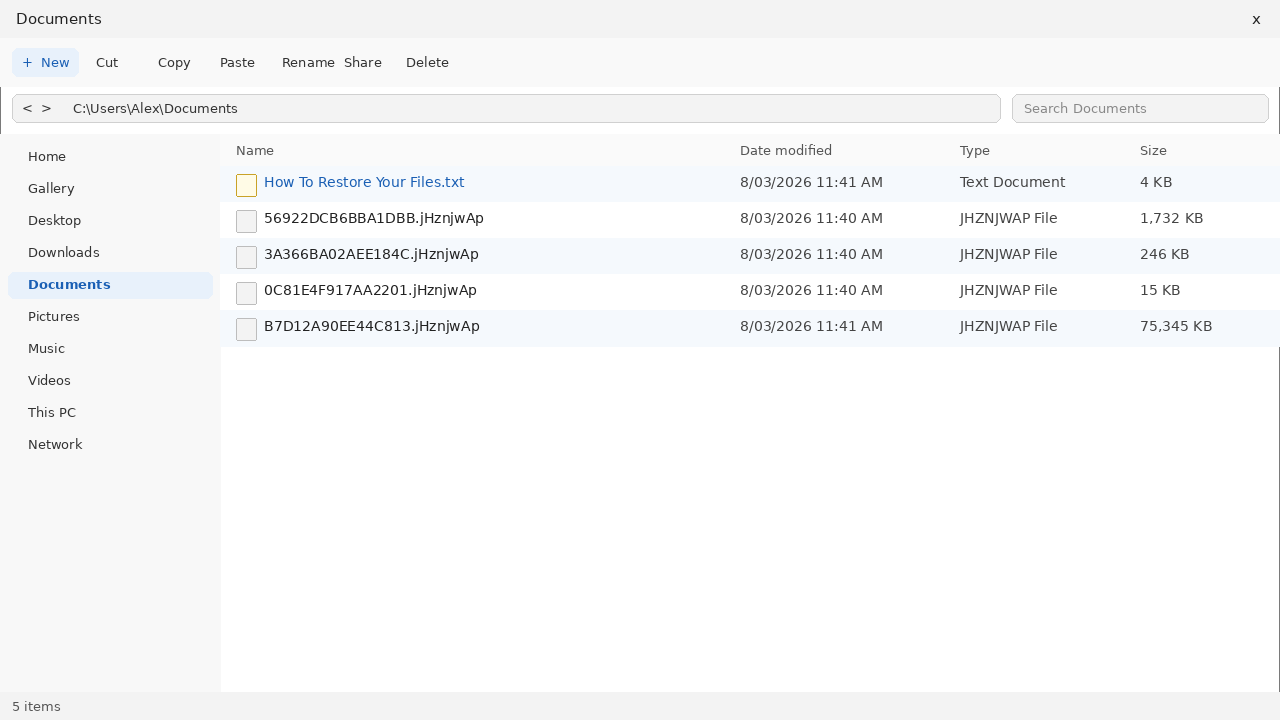 Encrypted files after PicMo. Random names plus How To Restore Your Files.txt are the tell.