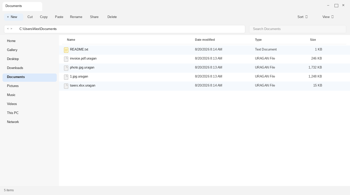 Encrypted files after Uragan. The .uragan names and README.txt are the tell.
