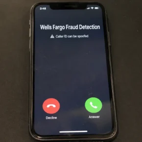 Phone screen showing a spoofed Wells Fargo Fraud Detection incoming call