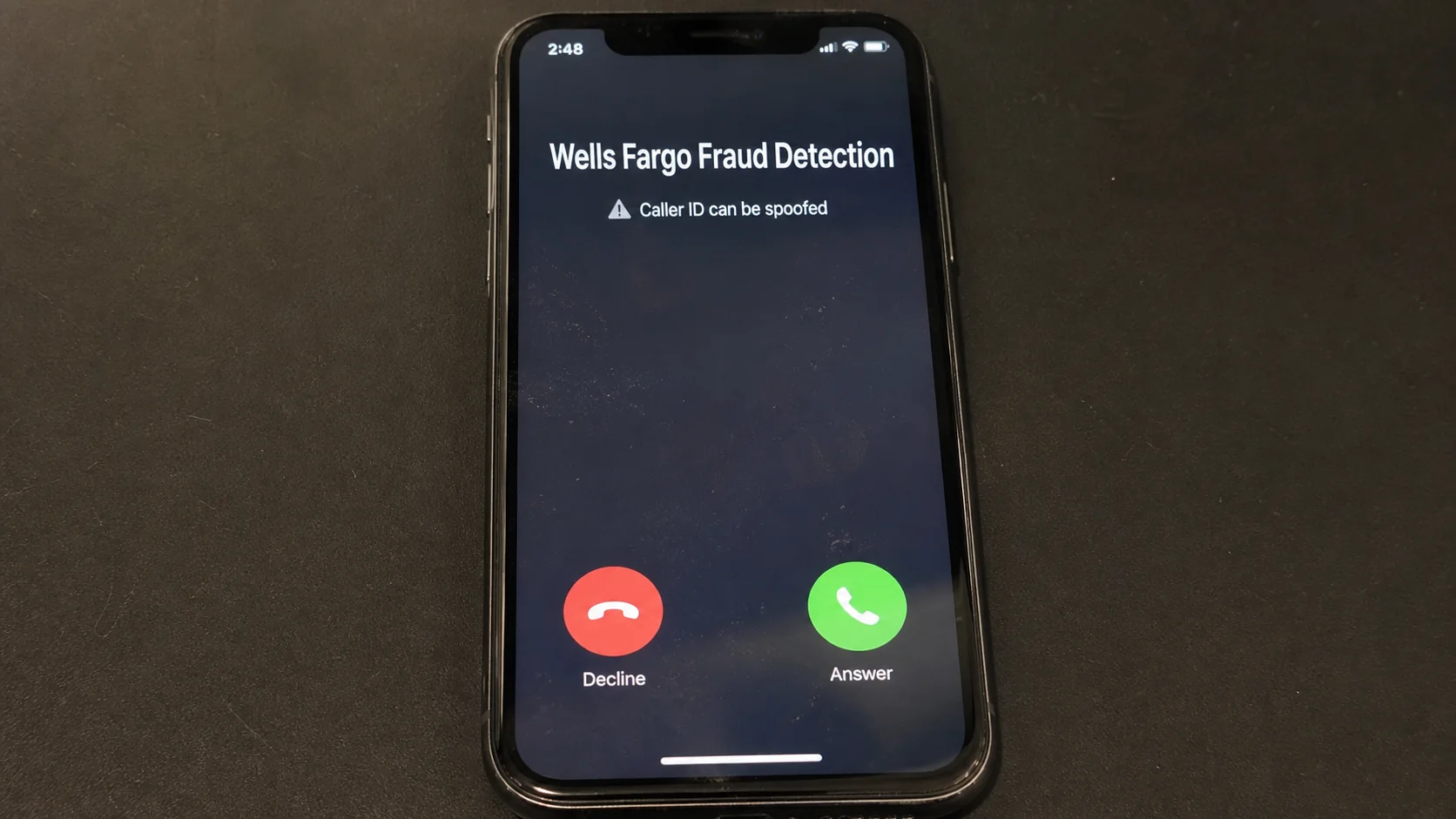 Phone screen showing a spoofed Wells Fargo Fraud Detection incoming call