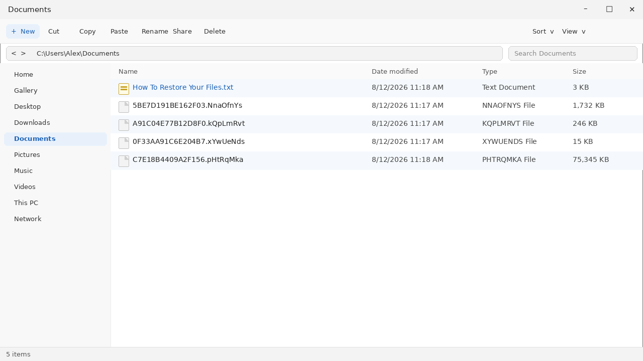 Encrypted files after ZAWOOO. Random names plus How To Restore Your Files.txt are the tell.