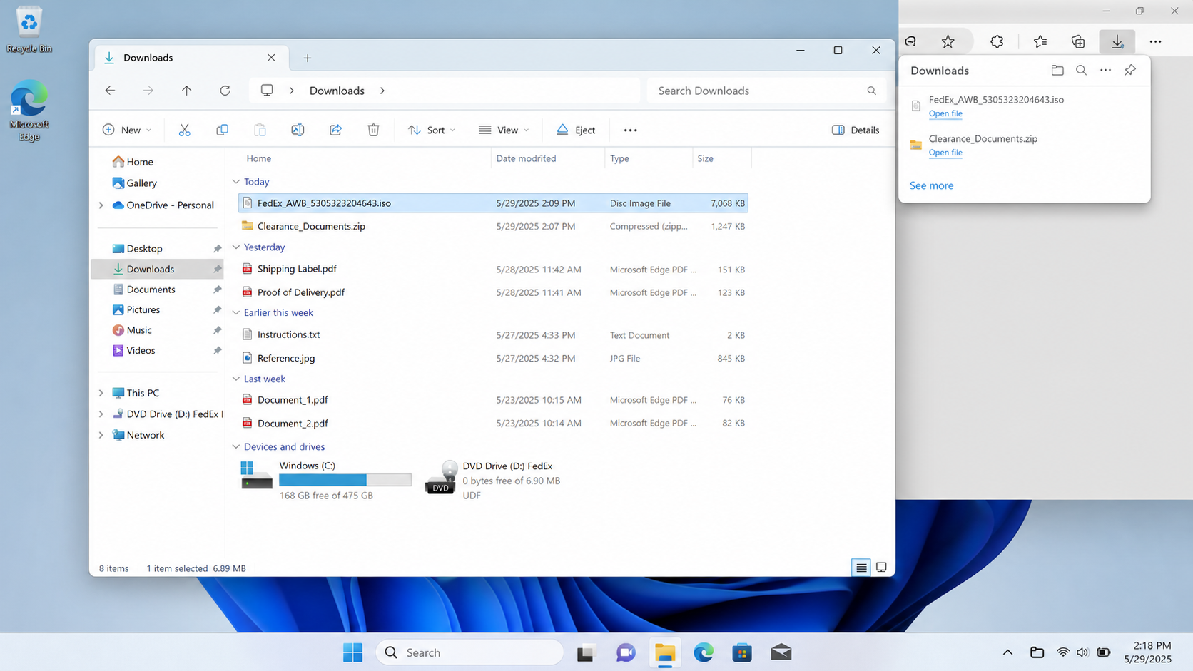 Windows Downloads folder containing a FedEx ISO disk image and protected archive