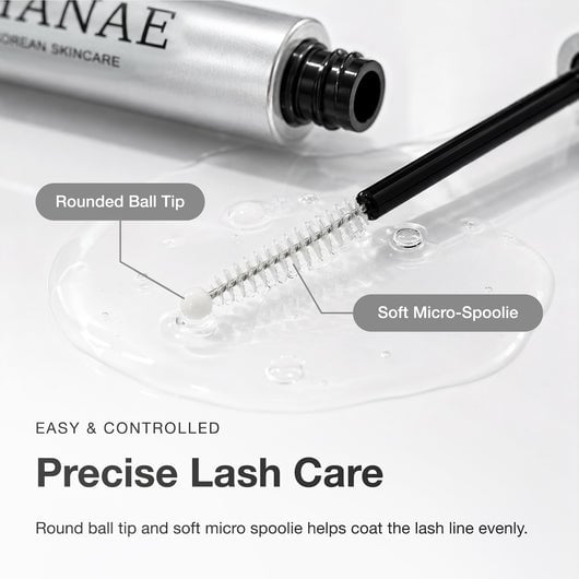 Close product view of the Hanae Eyelash Serum tube and applicator