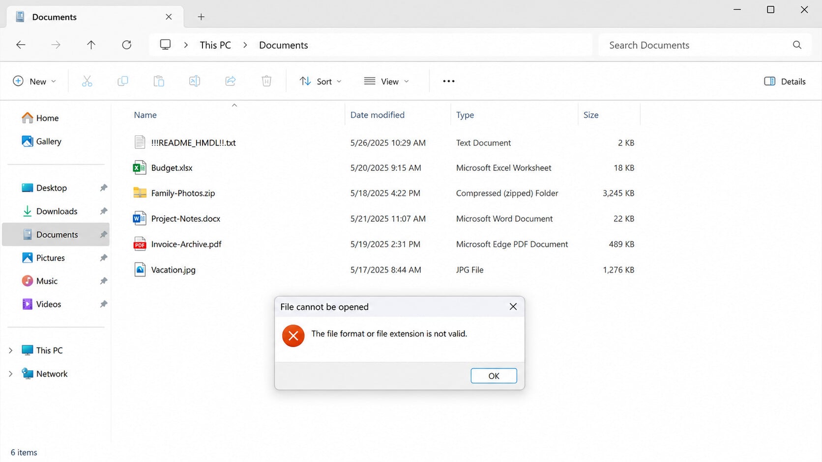Files encrypted by HMDL ransomware with their original filenames and an opening error
