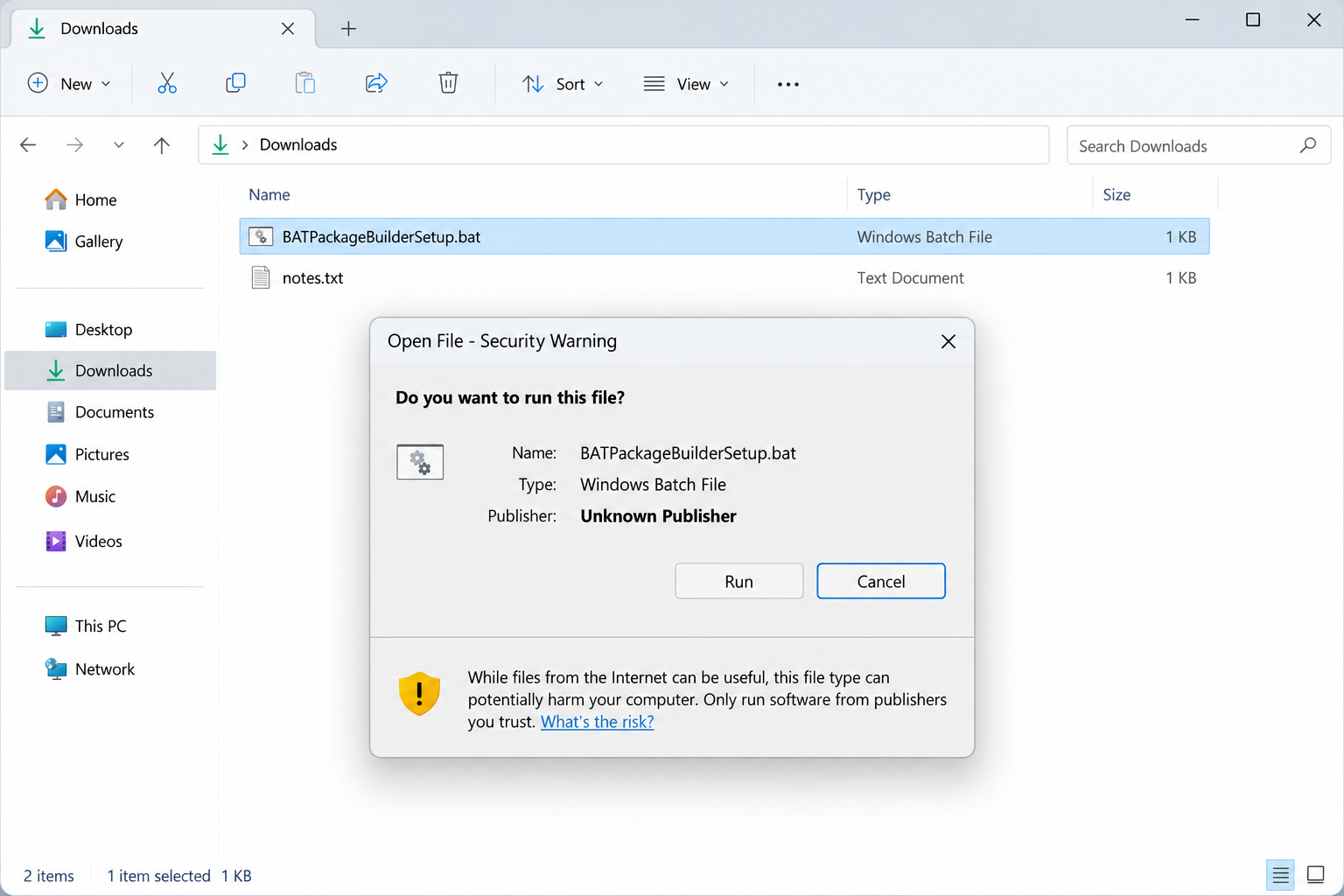 Illustrative Windows warning for BATPackageBuilderSetup.bat, the batch filename reported in an OXLOADER delivery chain