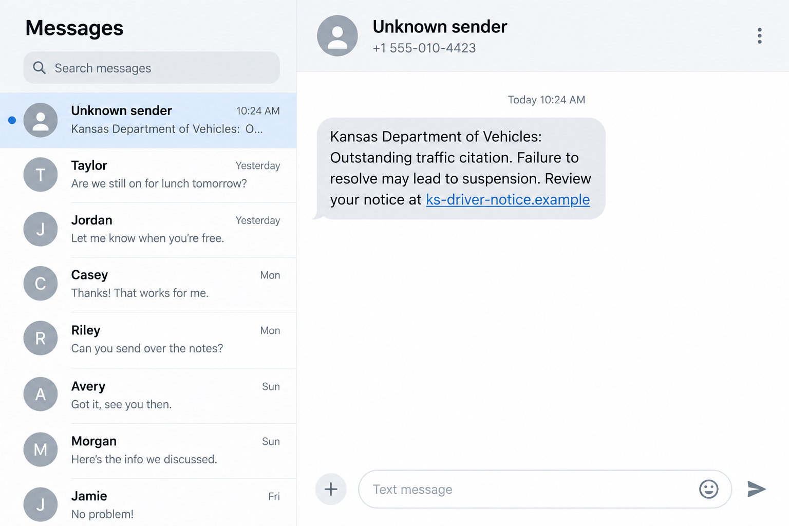 Fictional Kansas traffic citation message using an example payment address and a suspension threat