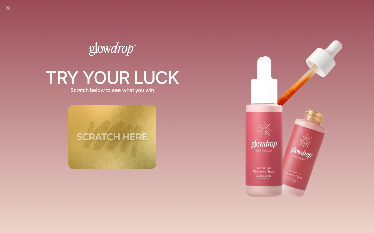 GlowDrop website promoting drinkable tanning drops with a scratch-card offer